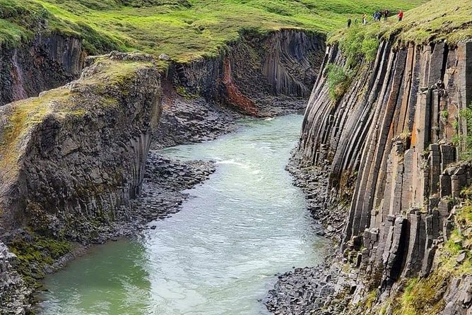 4, 5, 6 or 7-Day Small-Group Ring Road Tour from Reykjavik - Day 4: Akureyri harbor city, Hvíti serkur photos, and turf church charm