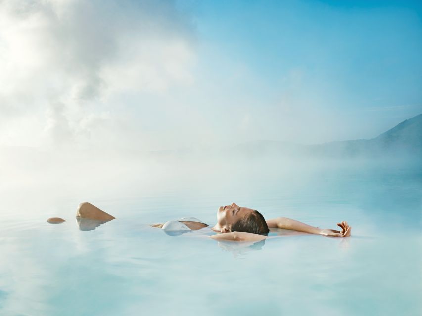From Reykjavik: Blue Lagoon Admission with Transfers - Your core experience: milky-blue geothermal water and the in-water bar break