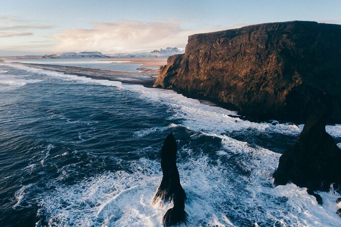 From Reykjavik: Glacier Hike, South Coast and Waterfalls Day Trip - Reynisfjara black sand beach: dramatic rock forms, big warning signs