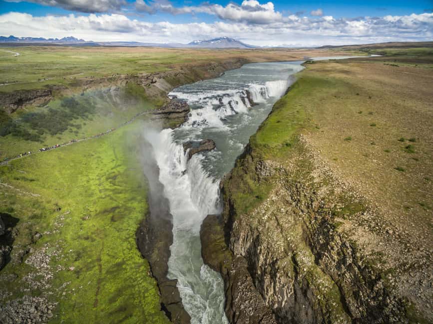 From Reykjavik: Golden Circle & Secret Lagoon Day Tour - Geysir stop: Faxi falls, bubbling mud, then Strokkur’s timing