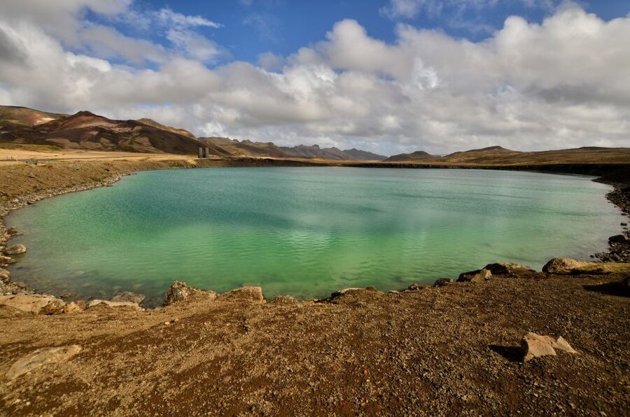 From Reykjavik: Reykjanes Geopark Tour & Airport Transfer - Gunnuhver mud pools: steaming sulfur, and a story that sticks