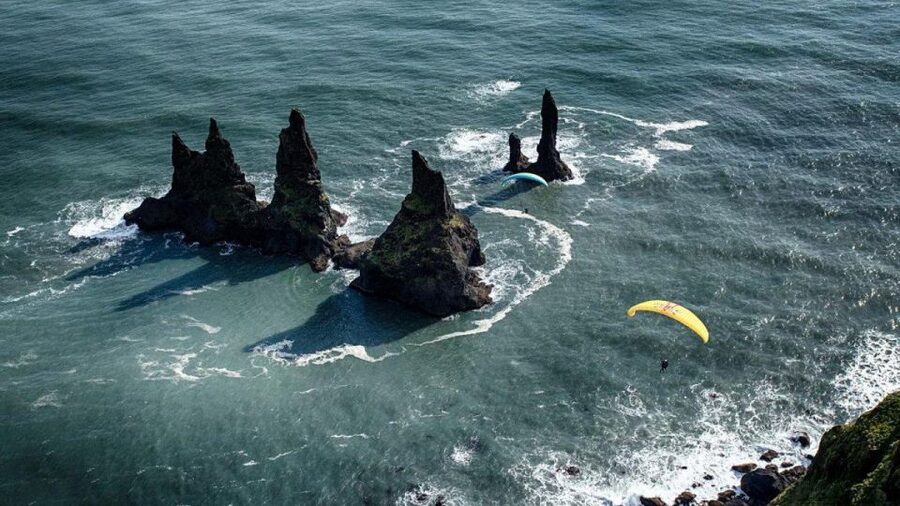From Reykjavík: Tandem Paragliding & South Iceland Day Tour - Tandem paragliding over Vík, then waterfalls and cliffs