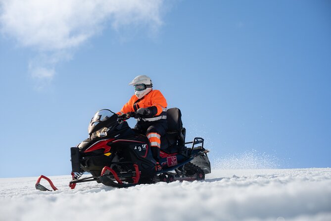 Iceland Golden Circle & Glacier Snowmobiling Guided Experience - Þingvellir National Park: tectonic plates and an old parliament