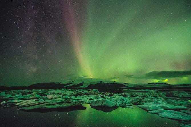 Northern Lights Small-Group Tour with Hot Chocolate & Photos - Aurora forecast first, then a minibus that actually moves