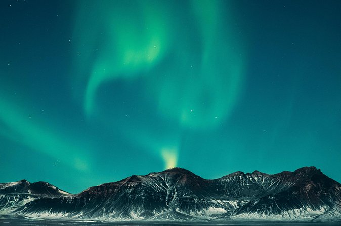 Northern Lights with hot chocolate, donuts and icelandic beer - One Stop, But It Gets You What You Came For