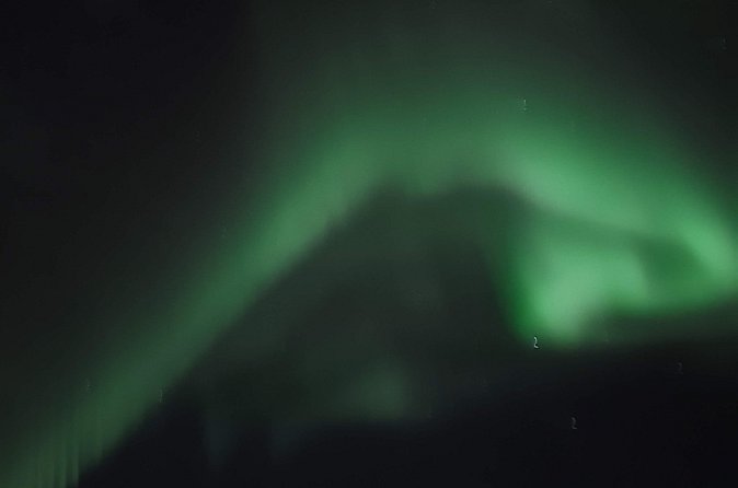 Northern Lights with hot chocolate, donuts and icelandic beer - Who This Northern Lights Tour Fits Best
