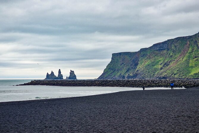 Paragliding and South Coast Waterfalls Day Tour from Reykjavík - Skógafoss: 60 meters of power and misty rainbow chances