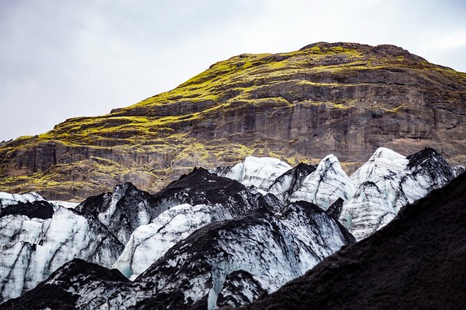 Private South Coast Fire and Ice: Glacier viewpoint & Lava Show - Solheimajökull glacier viewpoint walk: short hike, huge ice payoff