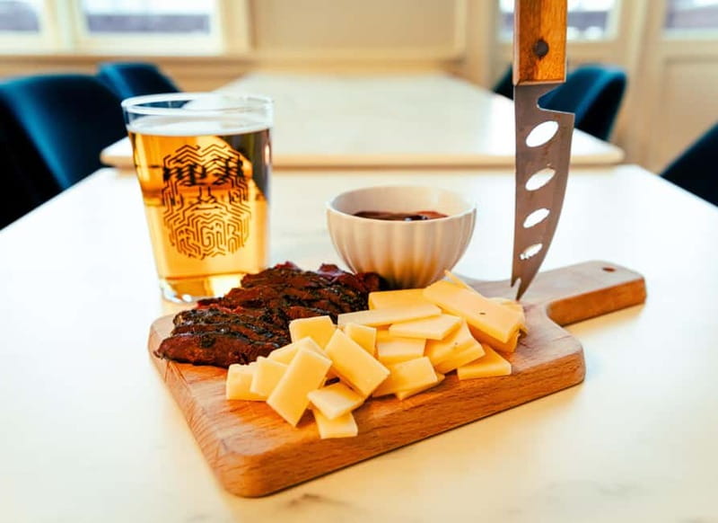Reykjavik: All in One - Eat, Drink & Explore with Locals - Stop 1: The first local bar for beer and Icelandic bites