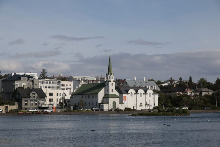 Reykjavik: Guided City Walking Tour - From Republic Park to the old center, where politics sits beside everyday life