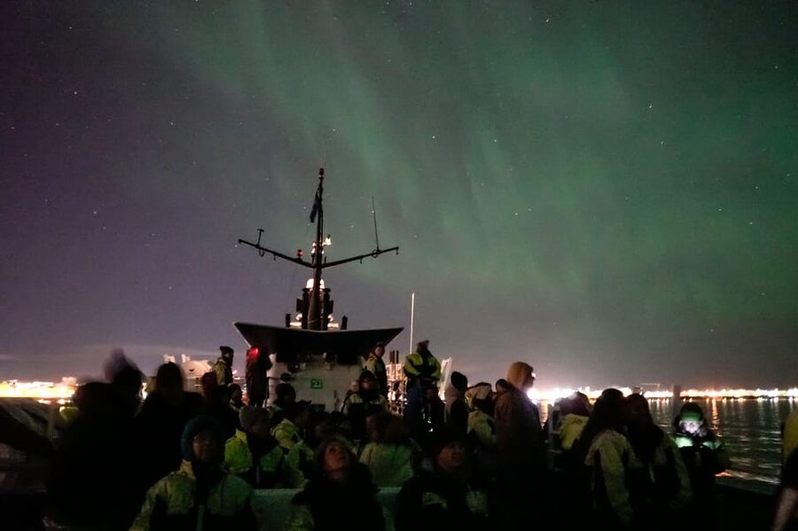 Reykjavik: Northern Lights Guided Boat Tour with Photos - Key highlights at a glance