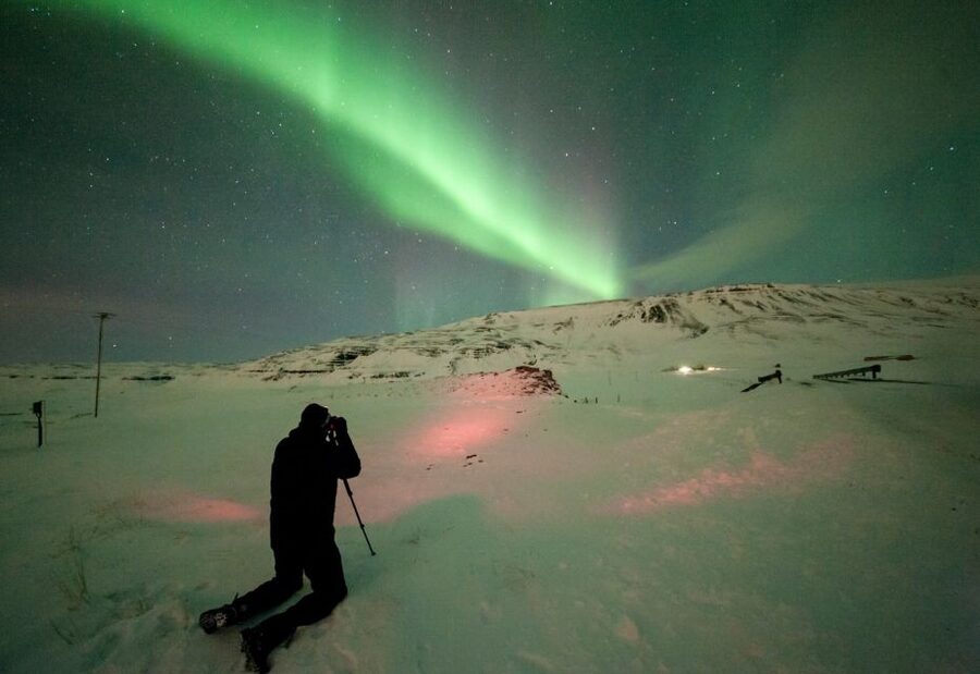 Reykjavik: Northern Lights Tour with Free Photos & Hot Cocoa - Four hours, from pickup to dark-sky photo stops