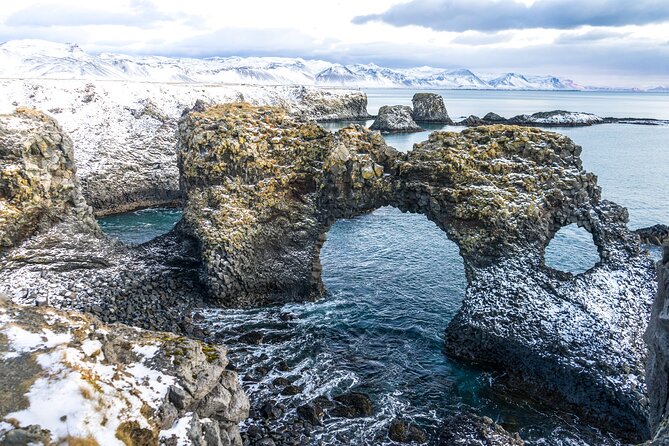 Reykjavík: Snæfellsnes & Kirkjufell Small Group Tour - Arnarstapi coastline walk and the natural rock arch at Miðgjá