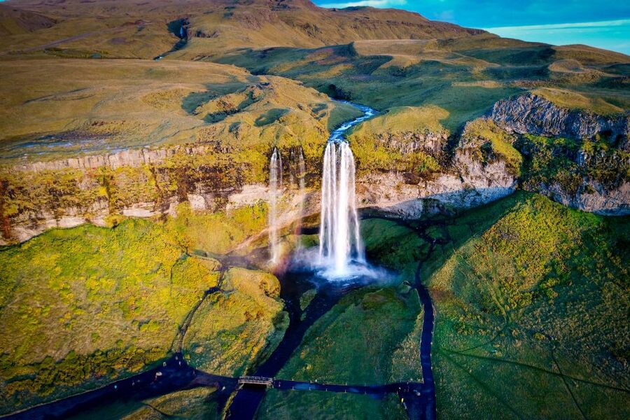 Black sand and a waterfall on Iceland&rsquo;s south coast