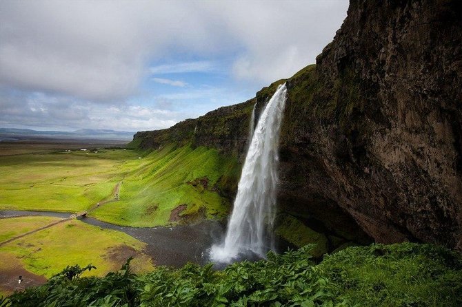 Reykjavik: South Coast, Waterfalls & Glacier Hike Small-Group - Skógafoss: 60 meters of power and a staircase viewpoint