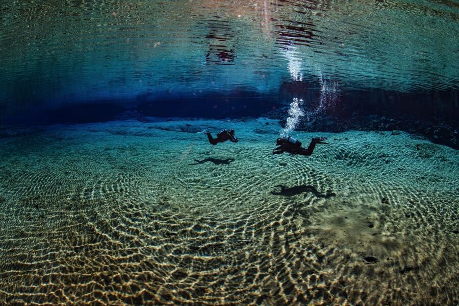 Silfra: Diving Between Tectonic Plates - Your half-day flow: pickup, briefing, four fissure sections