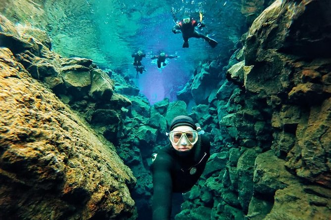 Silfra Wetsuit Snorkeling - Meet on Location | Free Photos - Inside the fissure: timing, buoyancy control, and the photo service