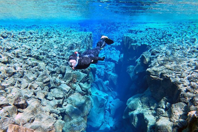 Silfra Wetsuit Snorkeling Tour with Underwater Photos - From Reykjavik - Warming up after: hot chocolate, then back to Reykjavík