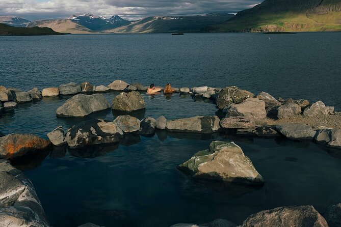 Small-Group Golden Circle, Hvammsvík Spa with Ticket & Crater - Stop 2 at Kerid Crater: mossy rim, iron-colored rocks, and a turquoise lake