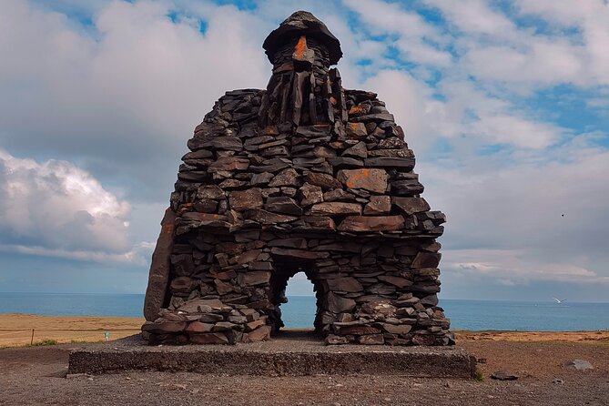 Snæfellsnes Peninsula Private Tour Iceland - Malariff Lighthouse: ocean horizon, sea birds, and sound
