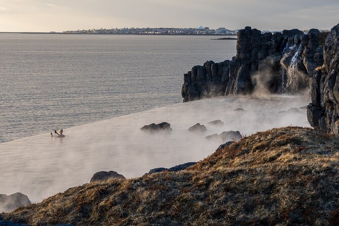 South Iceland Small Group Tour from Reykjavík with Sky Lagoon Spa - Seljalandsfoss: walking around the falls (yes, you might get soaked)