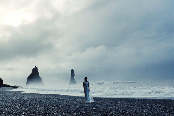 South Iceland Tour of Waterfalls, Black Sand Beaches & Dyrholaey - Stop 1: Reynisdrangar viewpoint near Vík, where the black pebble coast starts the day