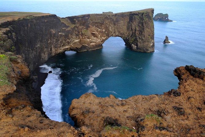South Iceland Tour of Waterfalls, Black Sand Beaches & Dyrholaey - Skógafoss: the 60-meter waterfall you walk right up to